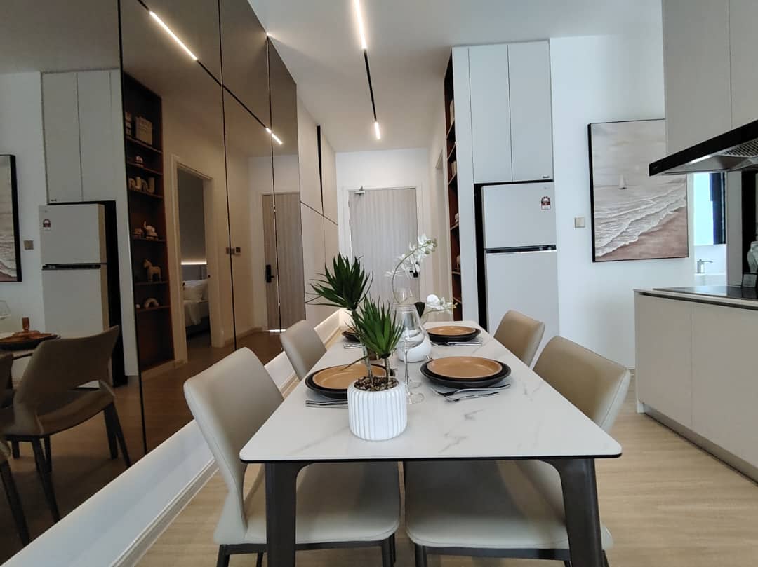 Dining room with marble-top table and pendant lighting