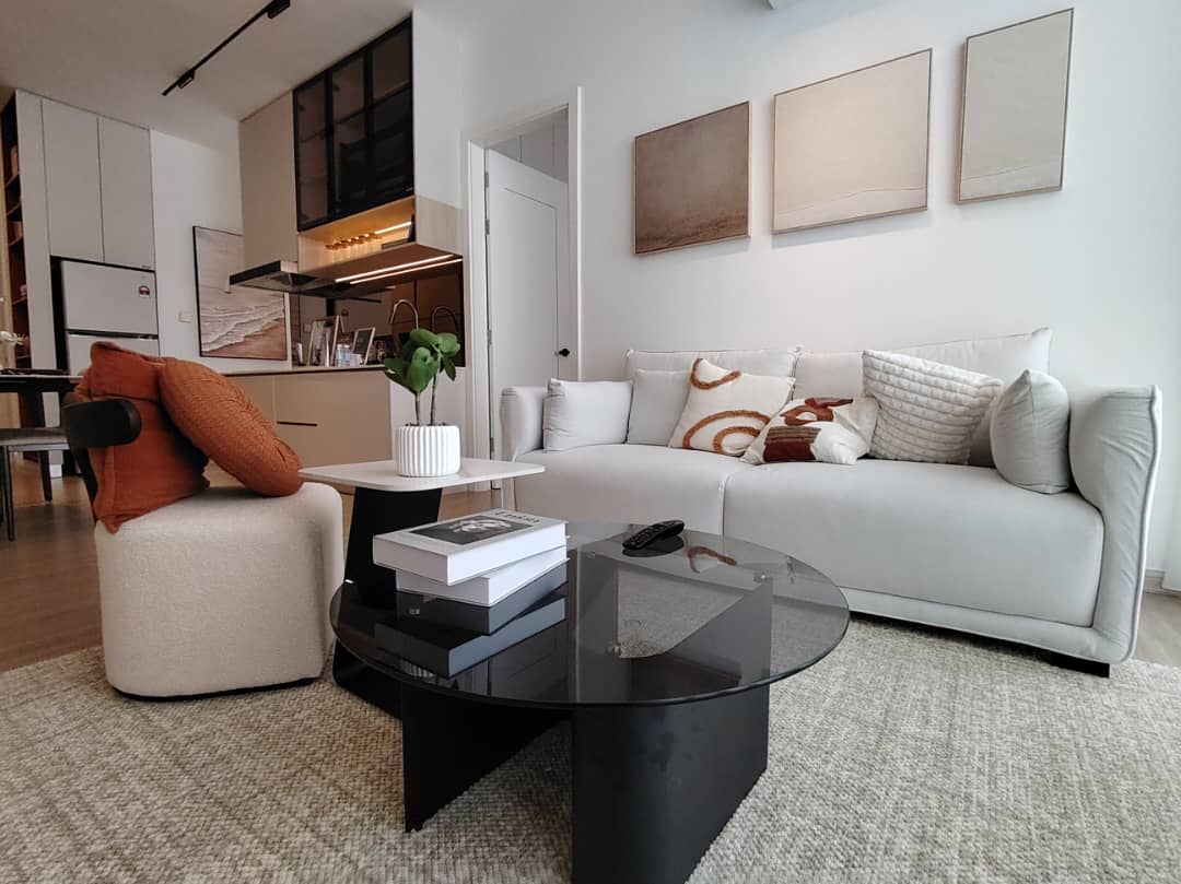 Living room lounge with contemporary sofa and art wall